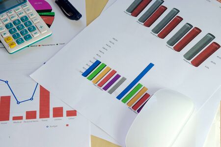 Graphs, charts, business table. The workplace of business people.の写真素材
