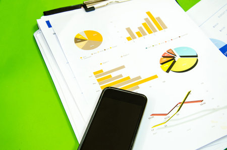 smart phone on business chartの写真素材