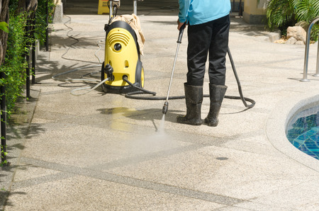 Outdoor floor cleaning with high pressure water jet