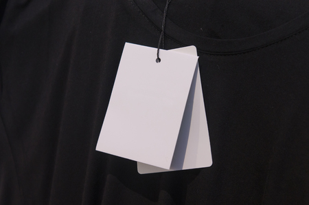 blank t-shirt and blank label tagの写真素材