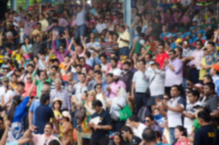 blurred background of crowd of People watching the show