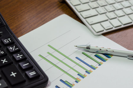 business concept.business document and graph on desk.