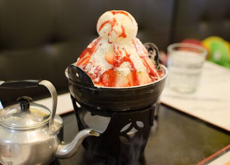 Ice blended milk topped strawberry and ice cream is a dessert of the Asia.の写真素材