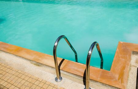 swimming pool and the steel ladder.の写真素材