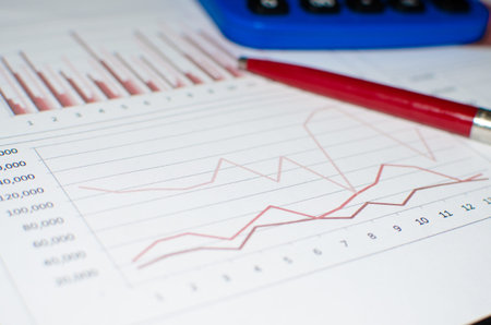 Business document with red line diagram.