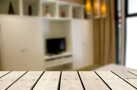 Wood table top Abstract blur beautiful luxury bedroom interior for background for product display montage.の写真素材
