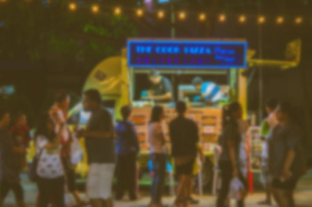 Abstract blurred  food truck festival - vintage tone ,as background.の写真素材