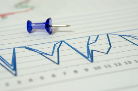 Business paper Line graph on desk.の写真素材