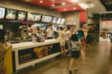 Blur people order food in the shop. Use as background image.の写真素材