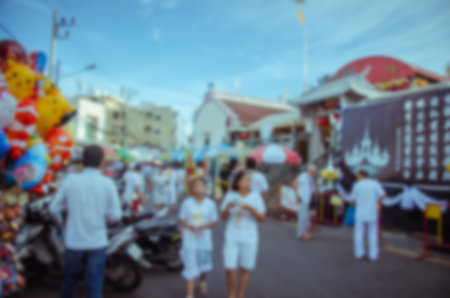 Abstract blurred background people walking in the old city of Phuket, Thailand.の写真素材