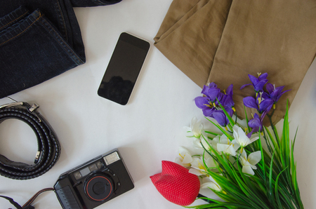 The concept of travel. Out of the traveler accessories. Flat lay traveler on a background with copy space and a Vintage tone.の写真素材