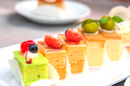 Delicious cake on plate on tableの写真素材