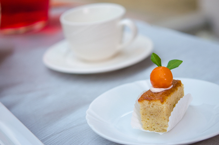 Delicious cake on plate on tableの写真素材