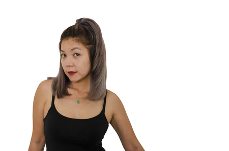Beautiful Asian girl wearing black shirt on white backgroundの写真素材