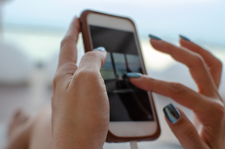 woman hand using a smart phone.の写真素材