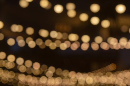 bokeh light on golden background.の写真素材