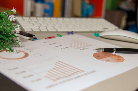 Business finance, accounting, statistics and analytic research concept on desk.の写真素材