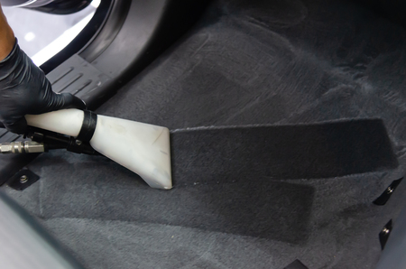 Wash the car carpet.Detailing on interior of modern car.の写真素材