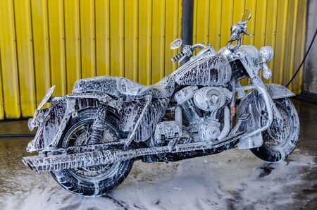 Wash Big Bikes with foam washing at the station.の写真素材