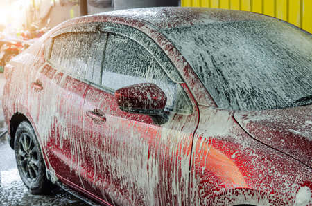 Car wash with foam bubbles.の写真素材