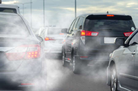 Pollution from vehicle exhaust in the city. Traffic jam on the roadのeditorial素材