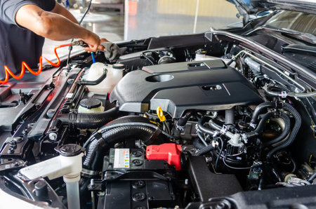 Car details - car engine mechanic, clean after washing the car engine