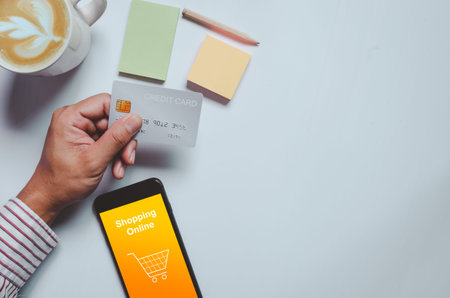 Business man holding credit card.Online shopping, business marketing through electronic payment with...