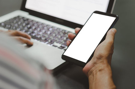 man hand holding a blank screen mockup smart phone