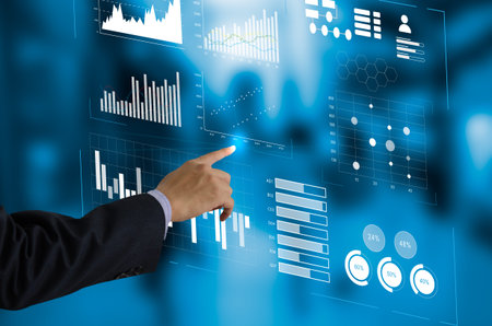 business chart and graph. Businessman touching virtual screen hologram. business technology concept