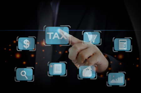 Tax payment  concept. Businessman touching tax  financial virtual button.payment by corporations...
