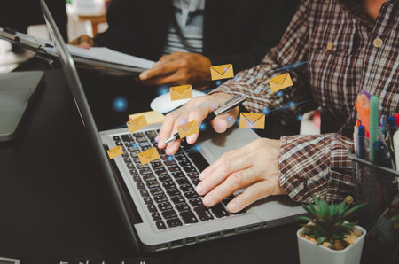 hand business man typing on a computer keyboard.Marketing business sending information to customers...