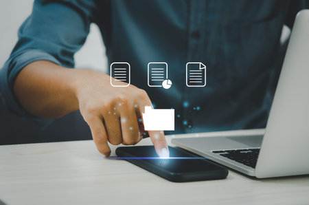Businessman touching on icons on virtual screen Enterprise Resource Planning ERP document...