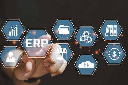 Businessman touching on virtual screen icon business ERP. Enterprise Resource Planning ERP document management conceptの写真素材