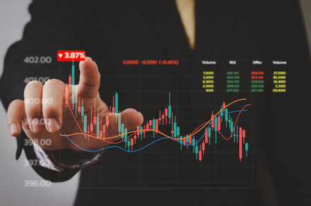 Businessman hand forex trading financial stock market by graph and economic technology investment...
