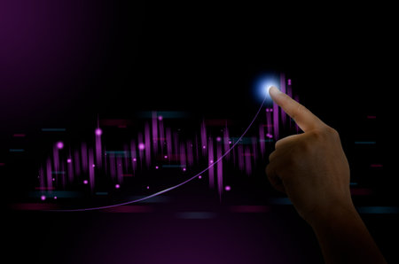 Man pointing with hand at graph of stock market financial exchange statistics and business chart of...