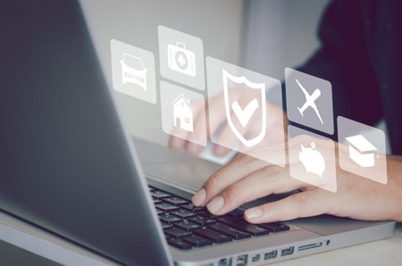 Man hand using a computer to type on a keyboard to find information on the Internet on social...