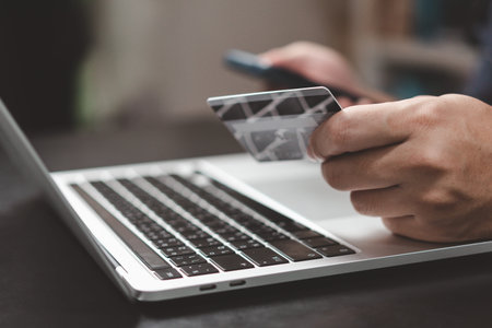 man paying and shopping with smartphone application e commerce wallet app technology. Man using...