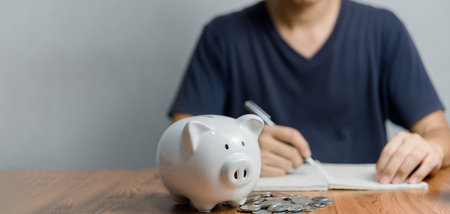 Saving money stack coin and piggy bank investment finance banking economy and tax profit business concept.の写真素材