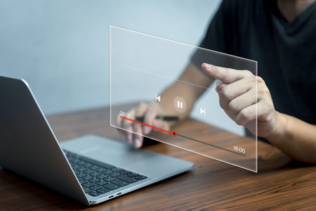 Man hand touching screen virtual streaming online, watching video on internet, live concert,...