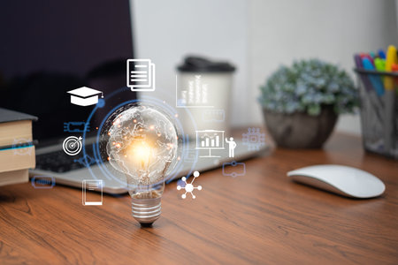 Bright lightbulb glowing with learning icons for study knowledge to creative thinking idea. Business...
