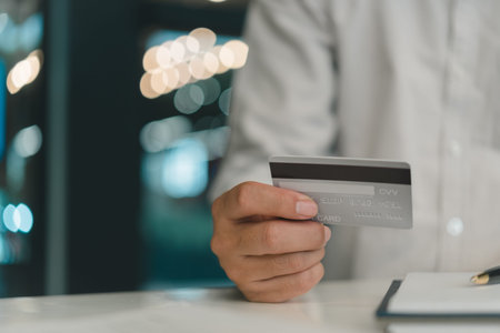 man holding credit card shopping online, finance payment commerce.