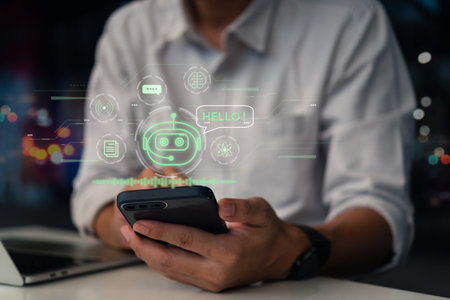 ChatGPT Chat with AI or Artificial Intelligence. Digital chatbot, robot application, OpenAI generate. Futuristic technology, Man using smartphone and computer on virtual screen.の写真素材