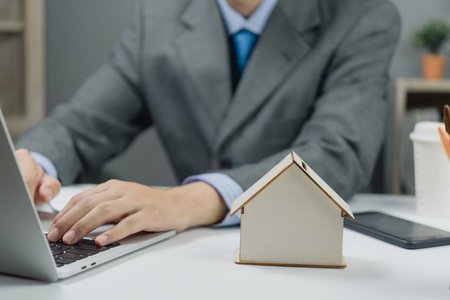 Insurance broker and loan with bank or house agent, real estate , house sale contract signing business concept.の写真素材