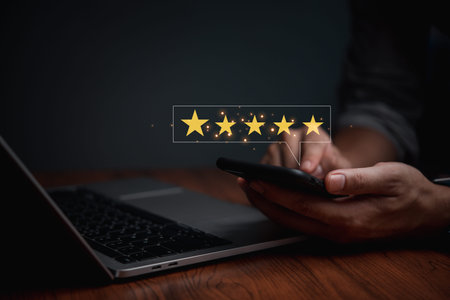 Customer satisfaction service, five star shape on a virtual digital screen with smartphone concept...