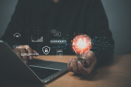 Business hand holding light bulb icon of cloud computing, ai security password, web browsing finance communication technology network.の写真素材