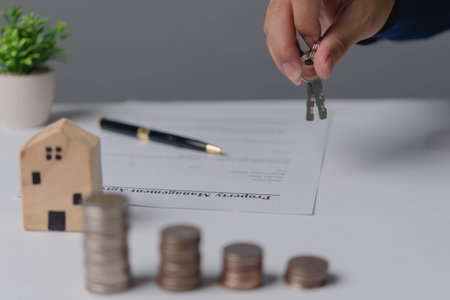 coin stack the model home bank. Saving money for real estate concept. Business management financial...