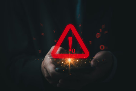 Businessman using mobile phone red triangle warning sign with exclamation point for error...