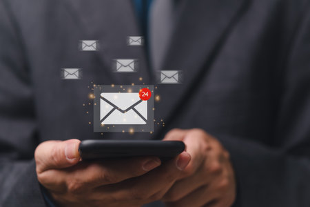 Email and message notification alert concept.  Business newsletter for electronic mail communication and digital online marketing. Inbox receiving newsletter electronic.の写真素材