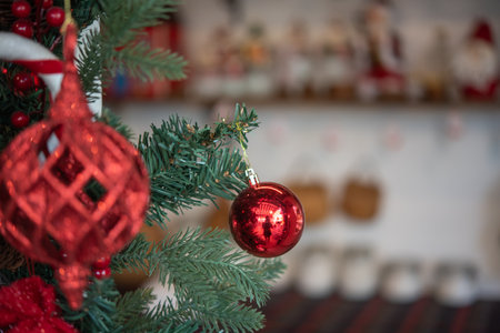 Christmas balls and decorations on the green christmas treeの写真素材