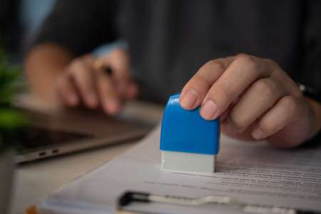 Contract law or paper work business and finance document rubber stamp. For official and legal...